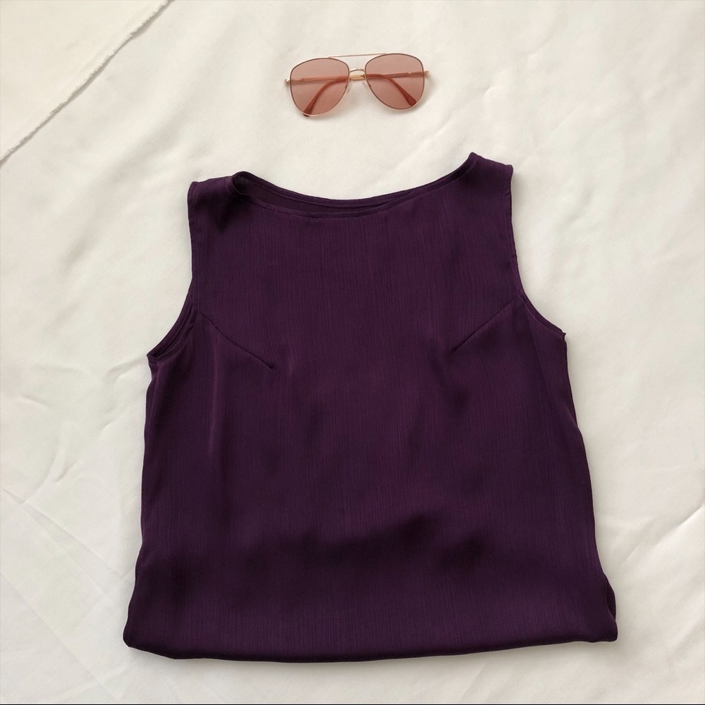 .Dark purple sleeveless blouse